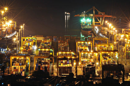 Port of Manila at night with cargo containers and ships