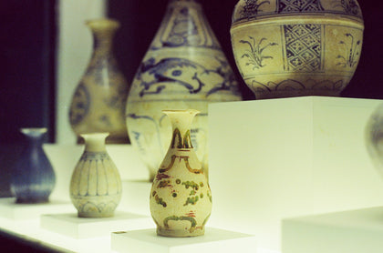 Collection of antique ceramic objects in a museum in Ho Chi Minh City, Vietnam. Photo: Hưng Phạm / Unsplash. Editorial illustrative image, not the Philippine collection.