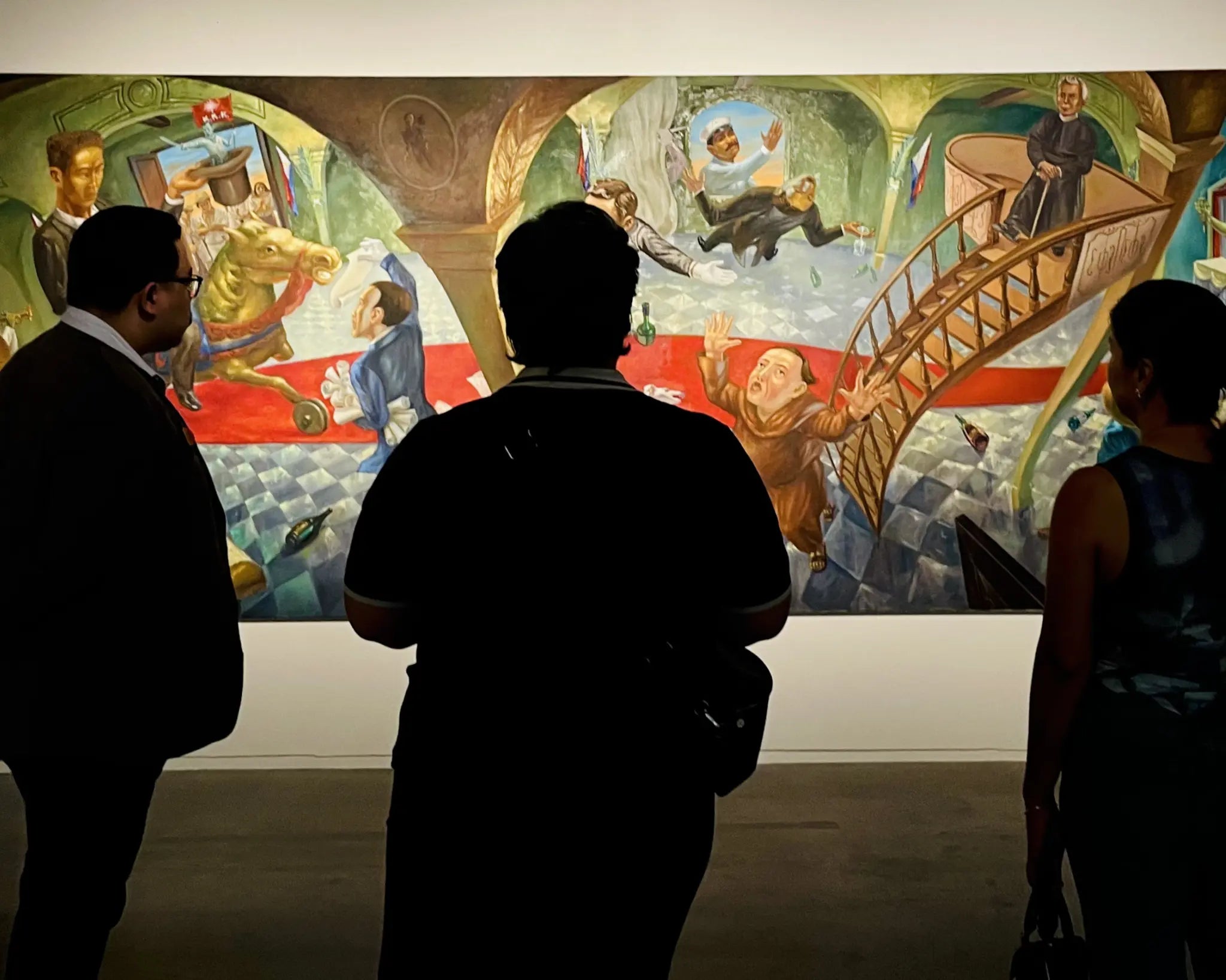 Guests viewing contemporary art during the July 2 Art of Gathering pilot